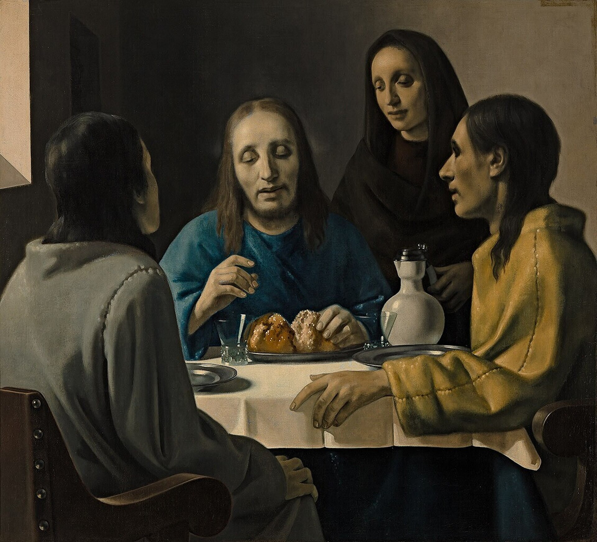 Los peregrinos de Emaús pintado por Van Meegeren en 1937: Cristo sentado a la mesa partiendo el pan entre tres figuras, a la manera de Vermeer