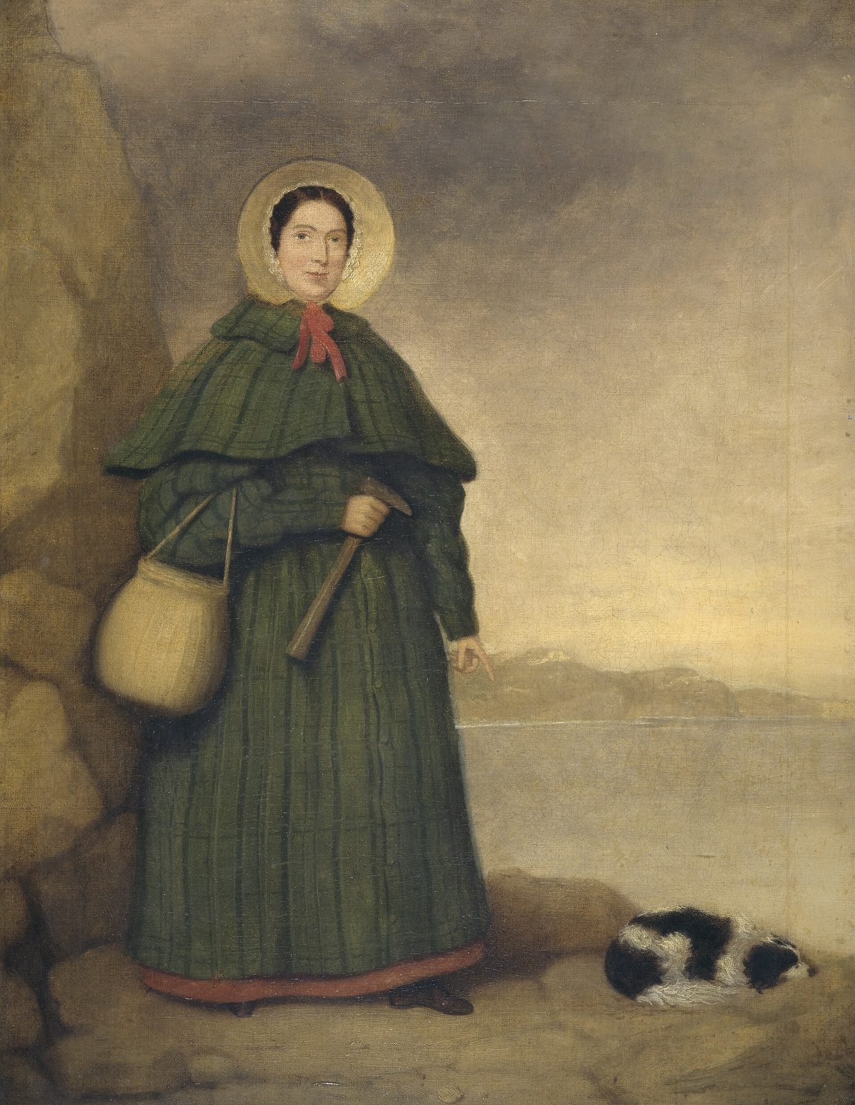 Retrato pintado de una mujer con capa y sombrero, con un martillo y una cesta, y un perro pequeño a sus pies, en un paisaje de acantilados