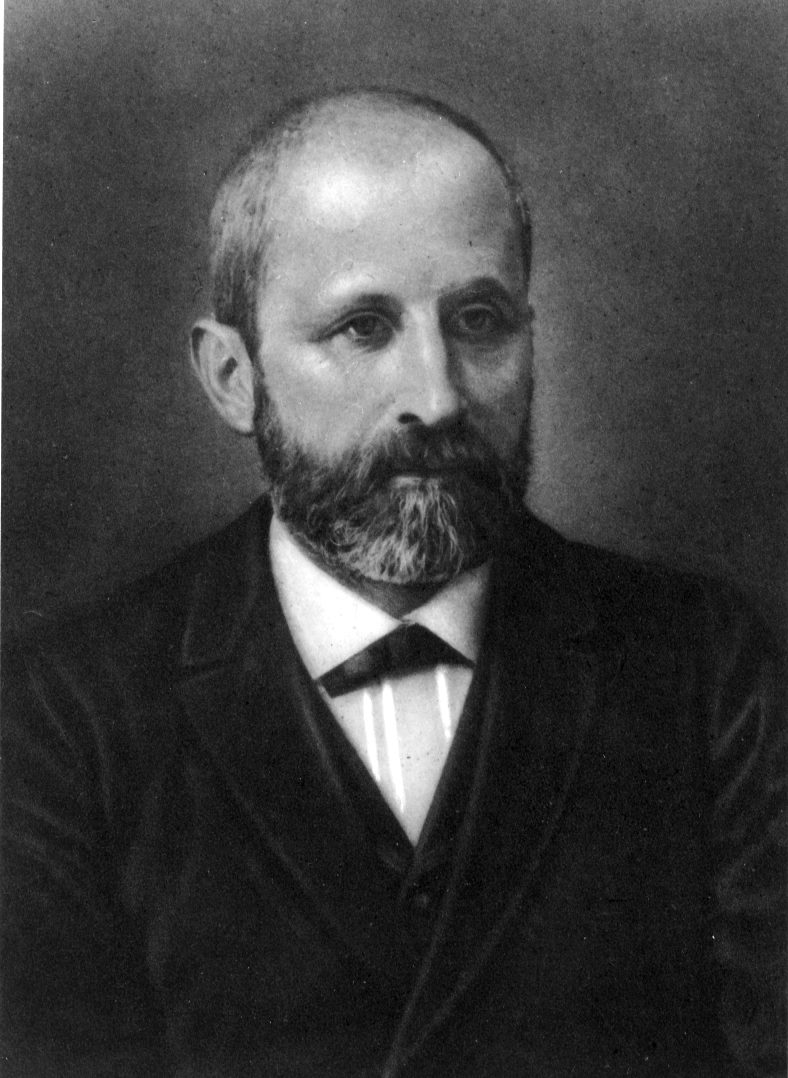 Retrato en blanco y negro de un hombre con barba y traje oscuro del siglo XIX